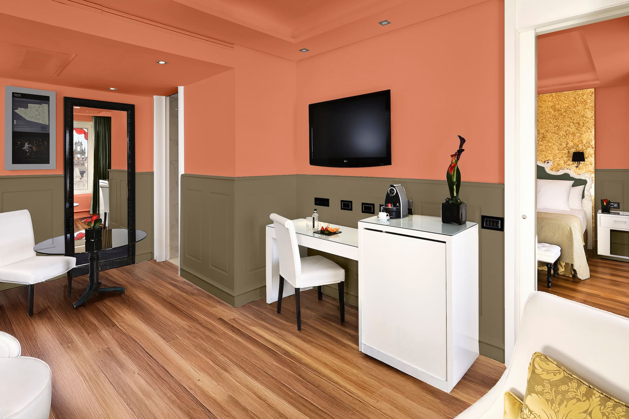 a room with a tv and a table