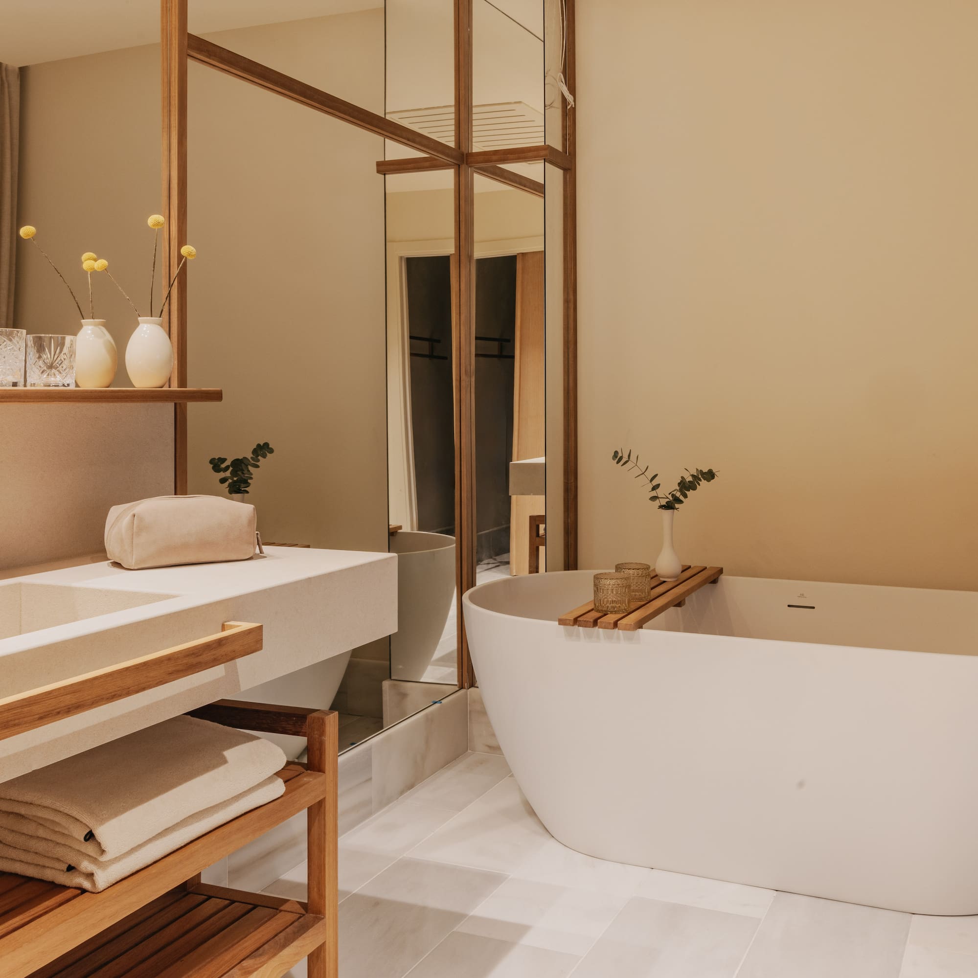 a bathroom with a tub and sink