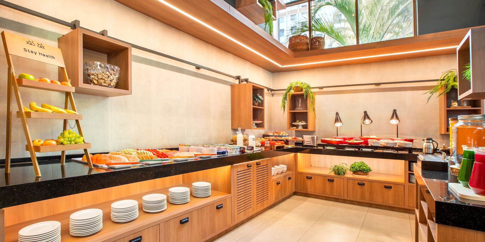 a buffet line with food on the counter