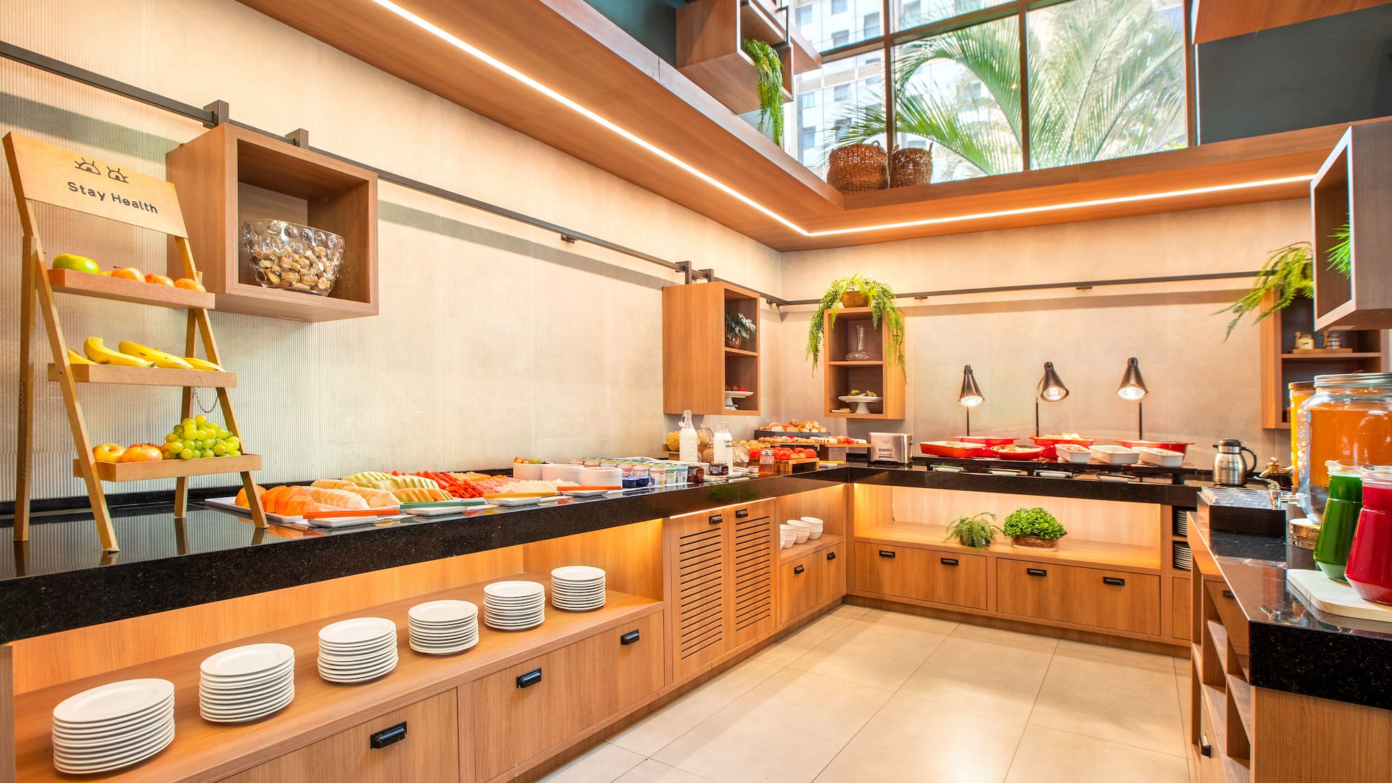 a buffet line with food on the counter