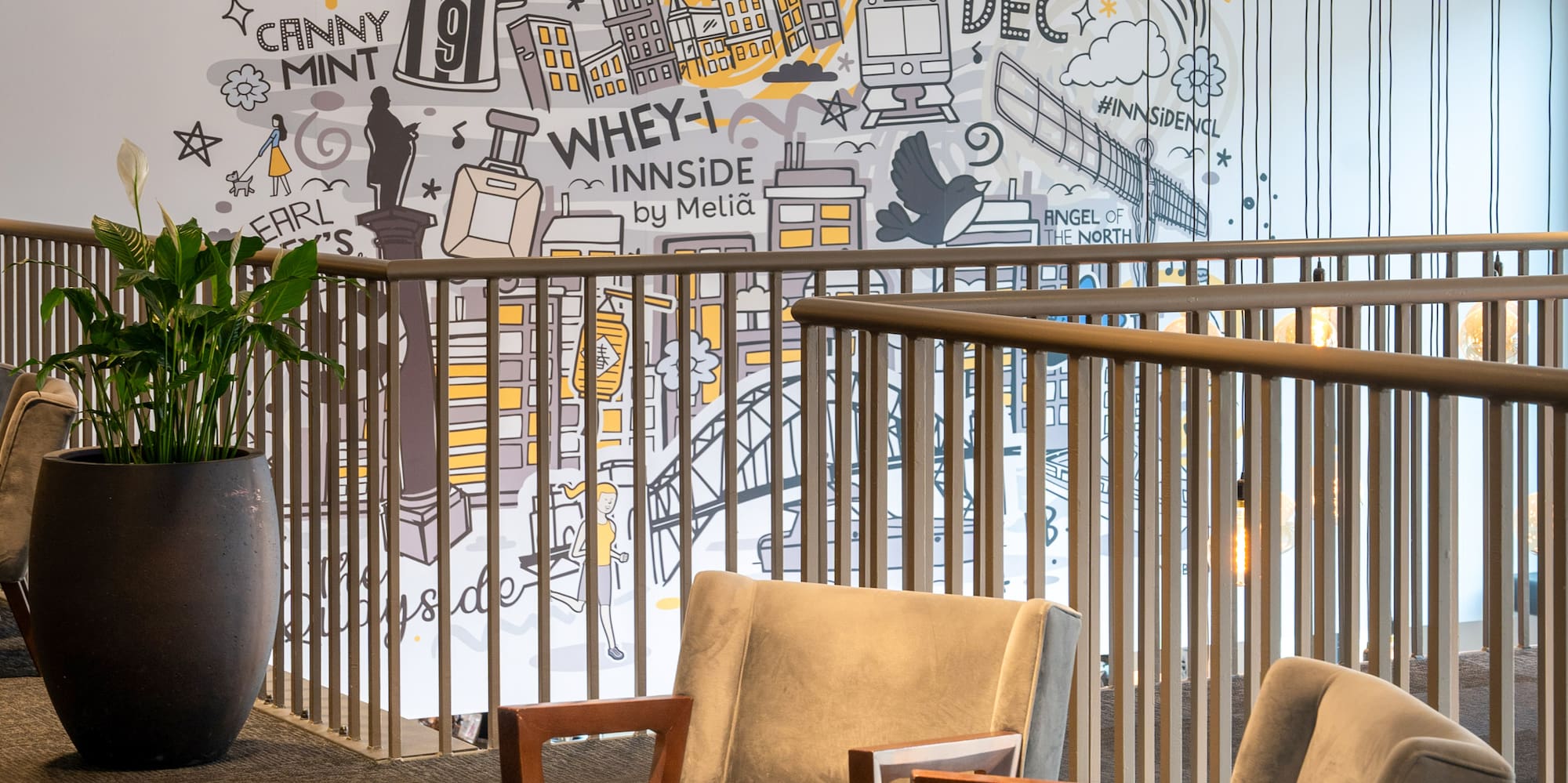 chairs in a room with a railing