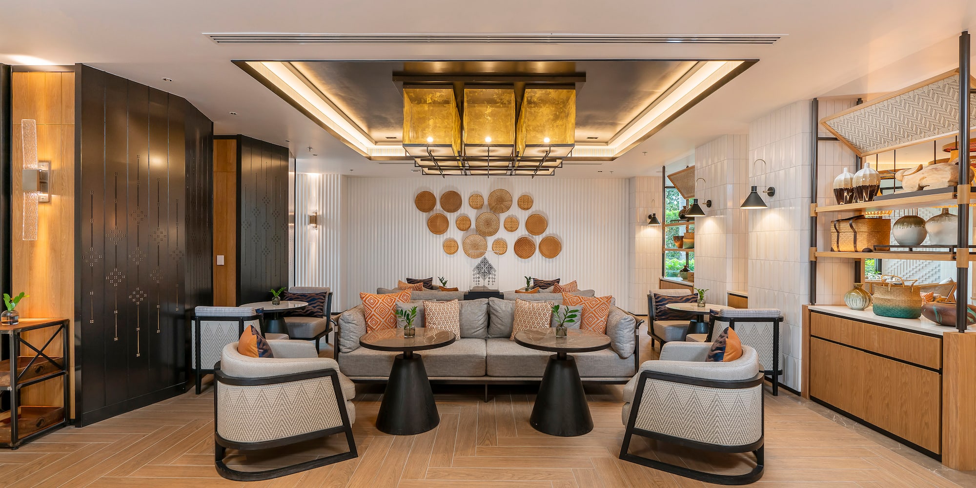 a room with a couch and tables