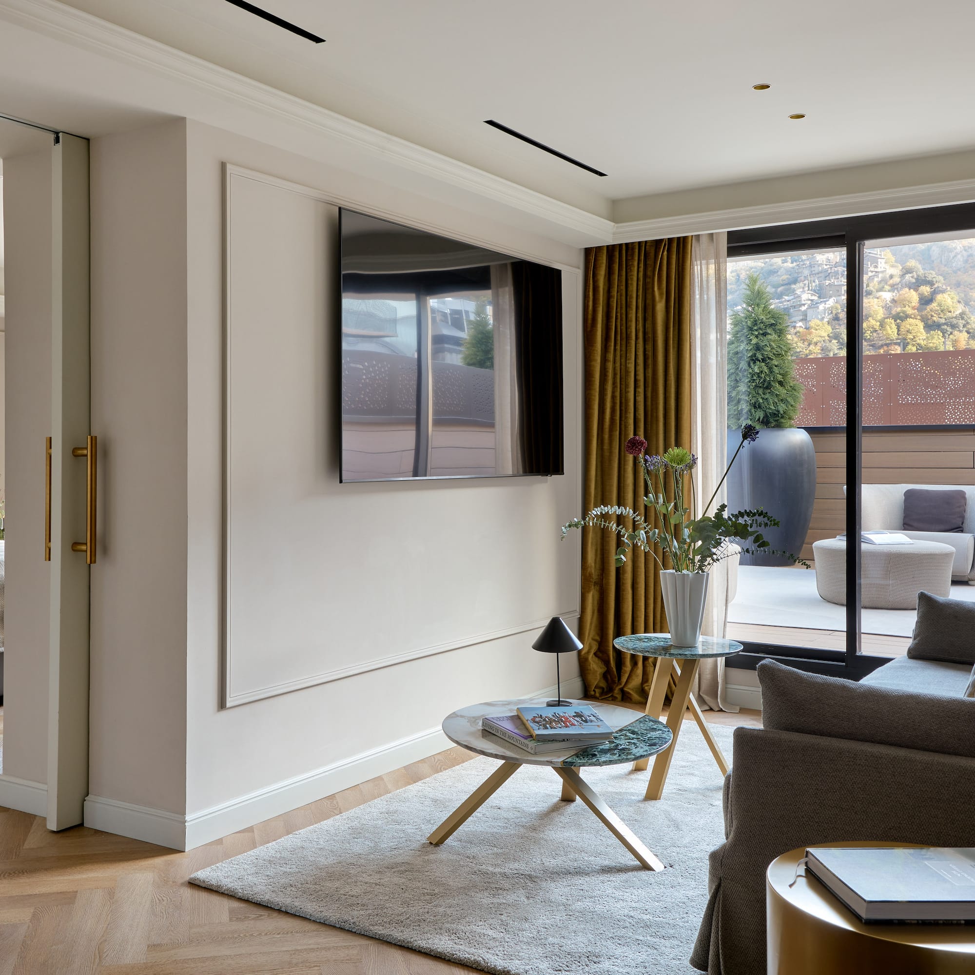 a living room with a television and a living room