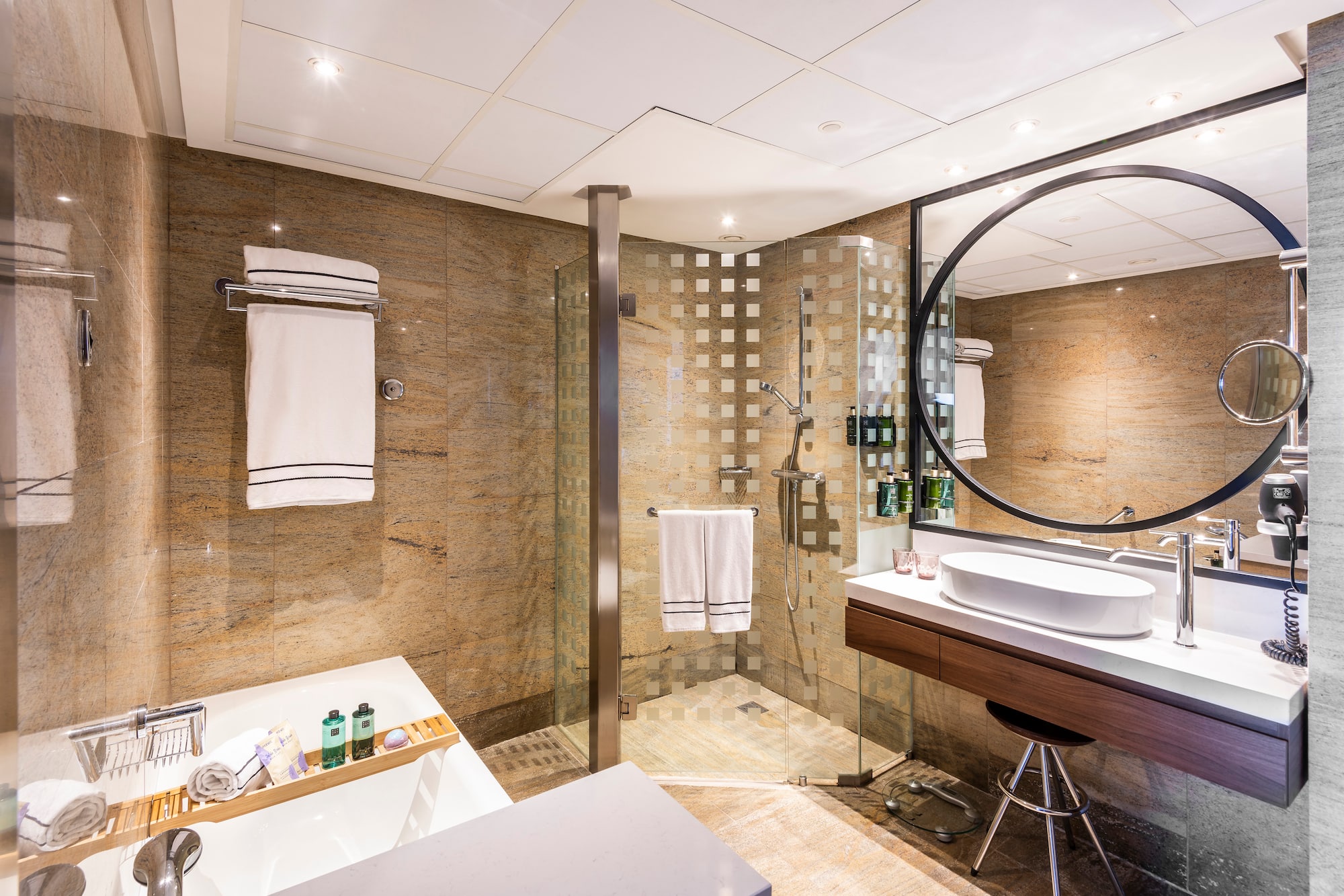 a bathroom with a shower and sink