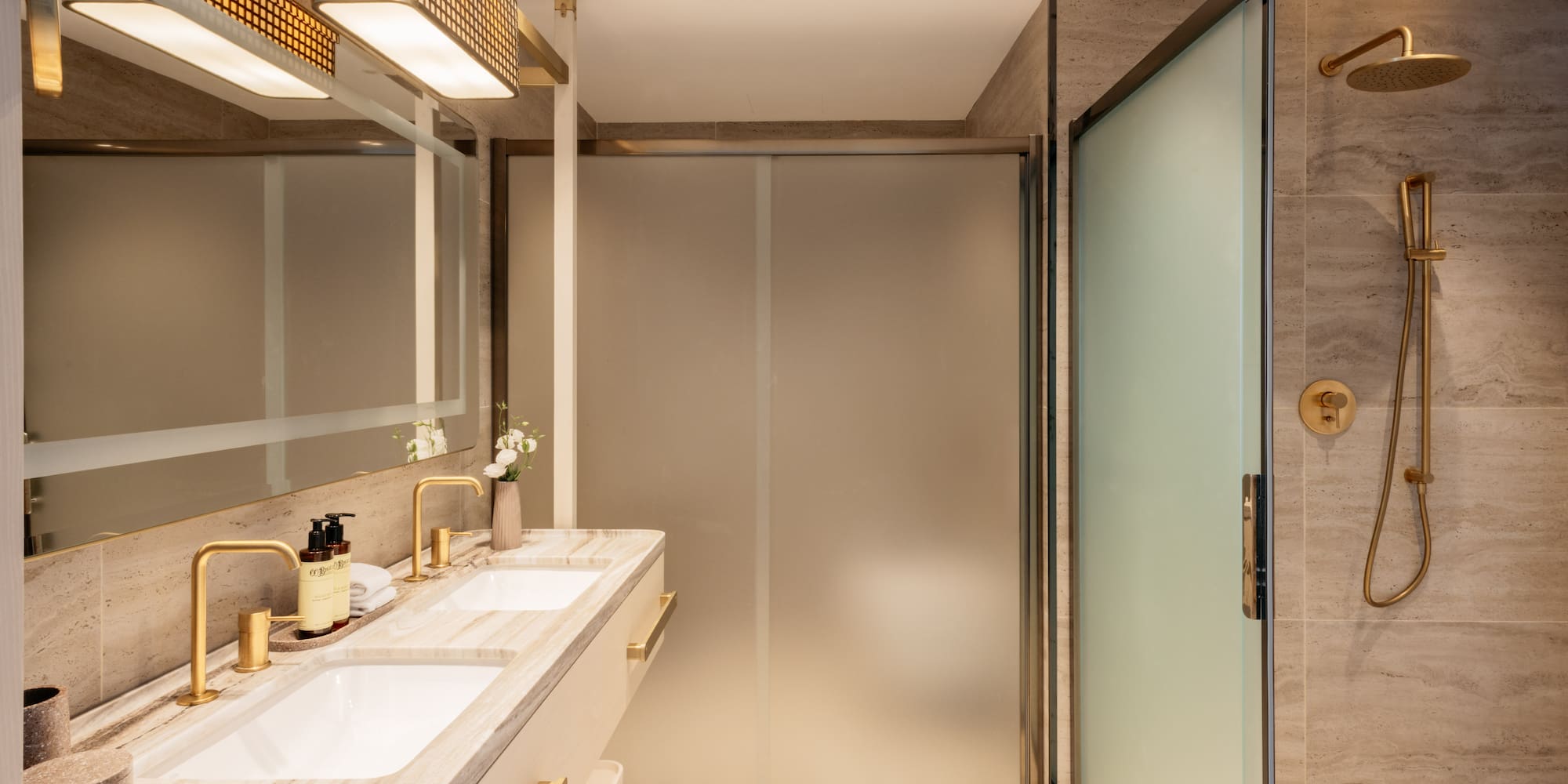 a bathroom with a shower and sink