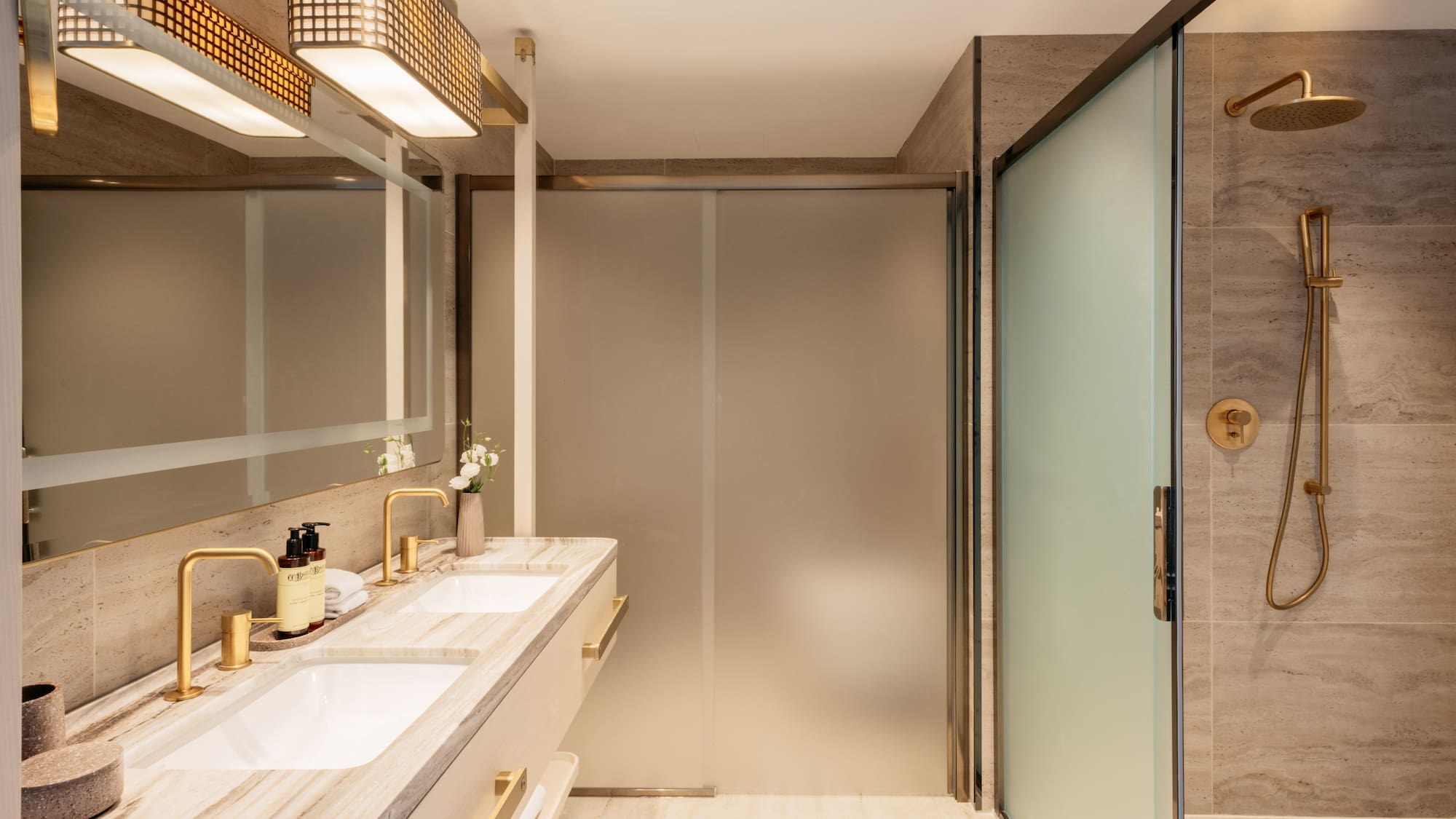 a bathroom with a shower and sink