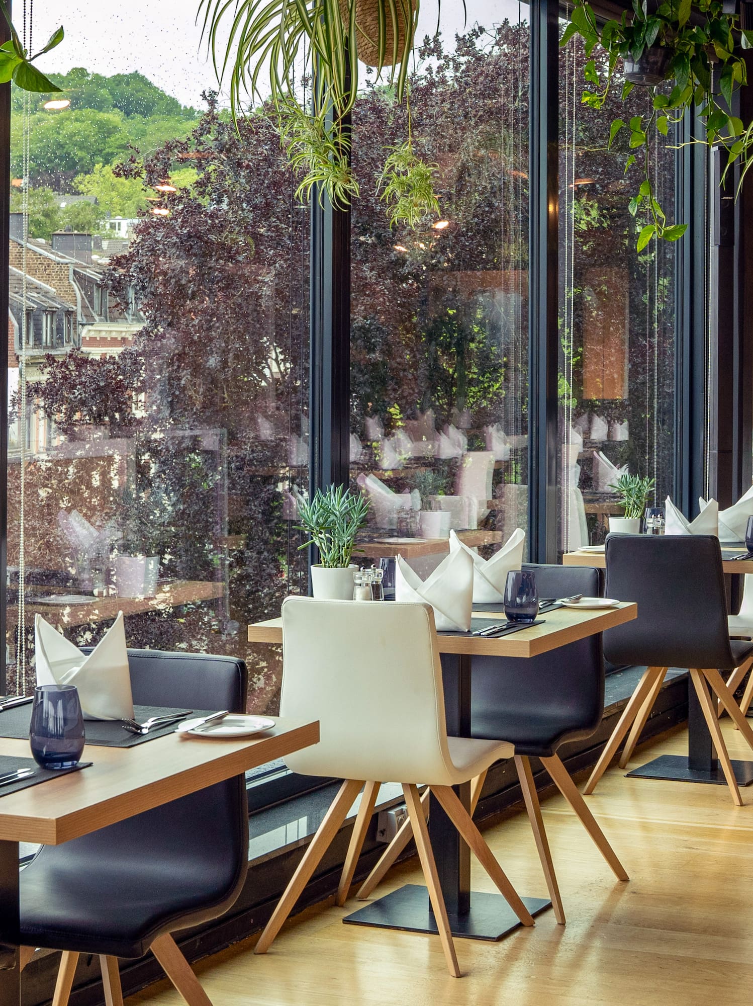 a restaurant with tables and chairs