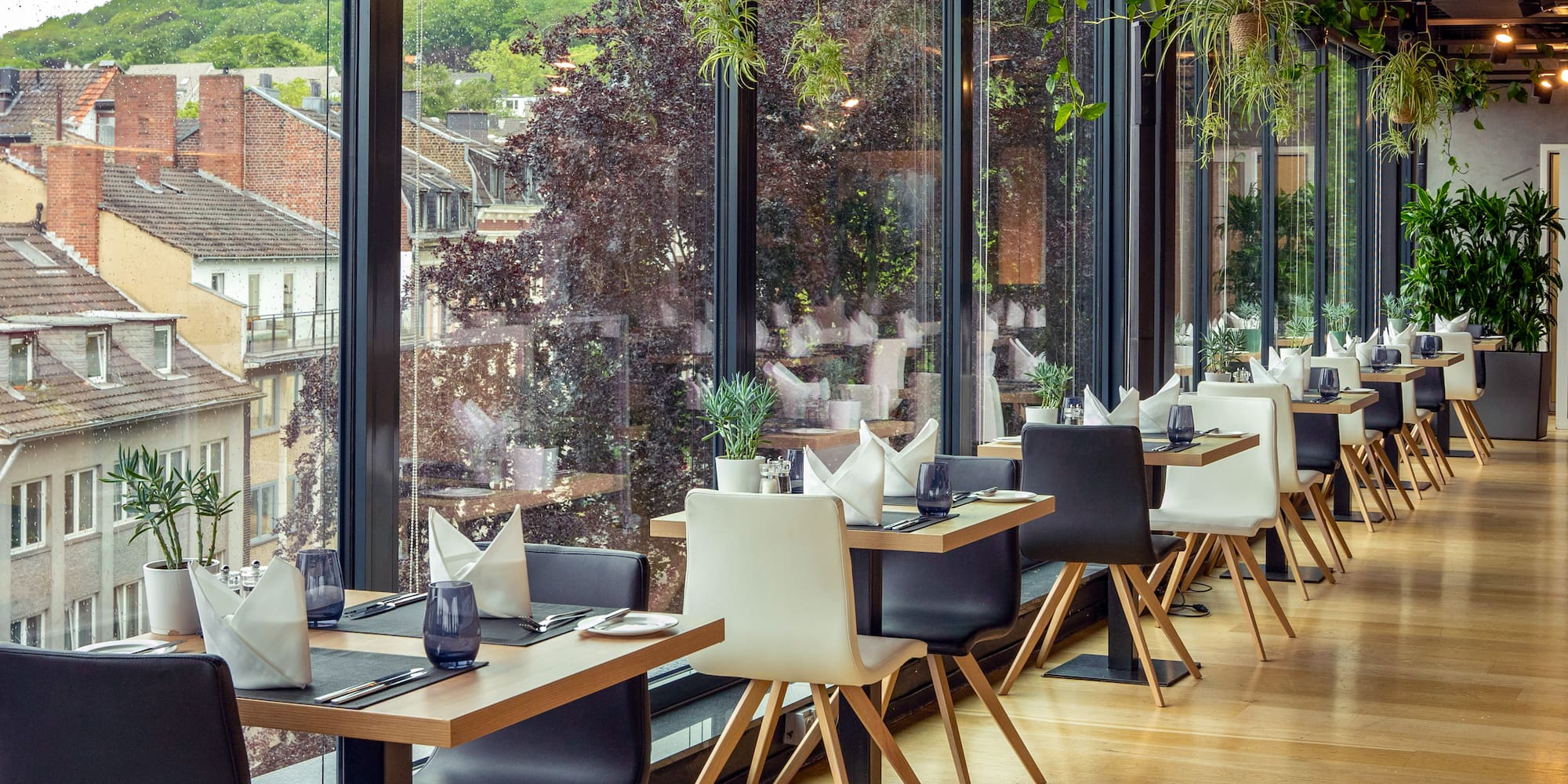 a restaurant with tables and chairs
