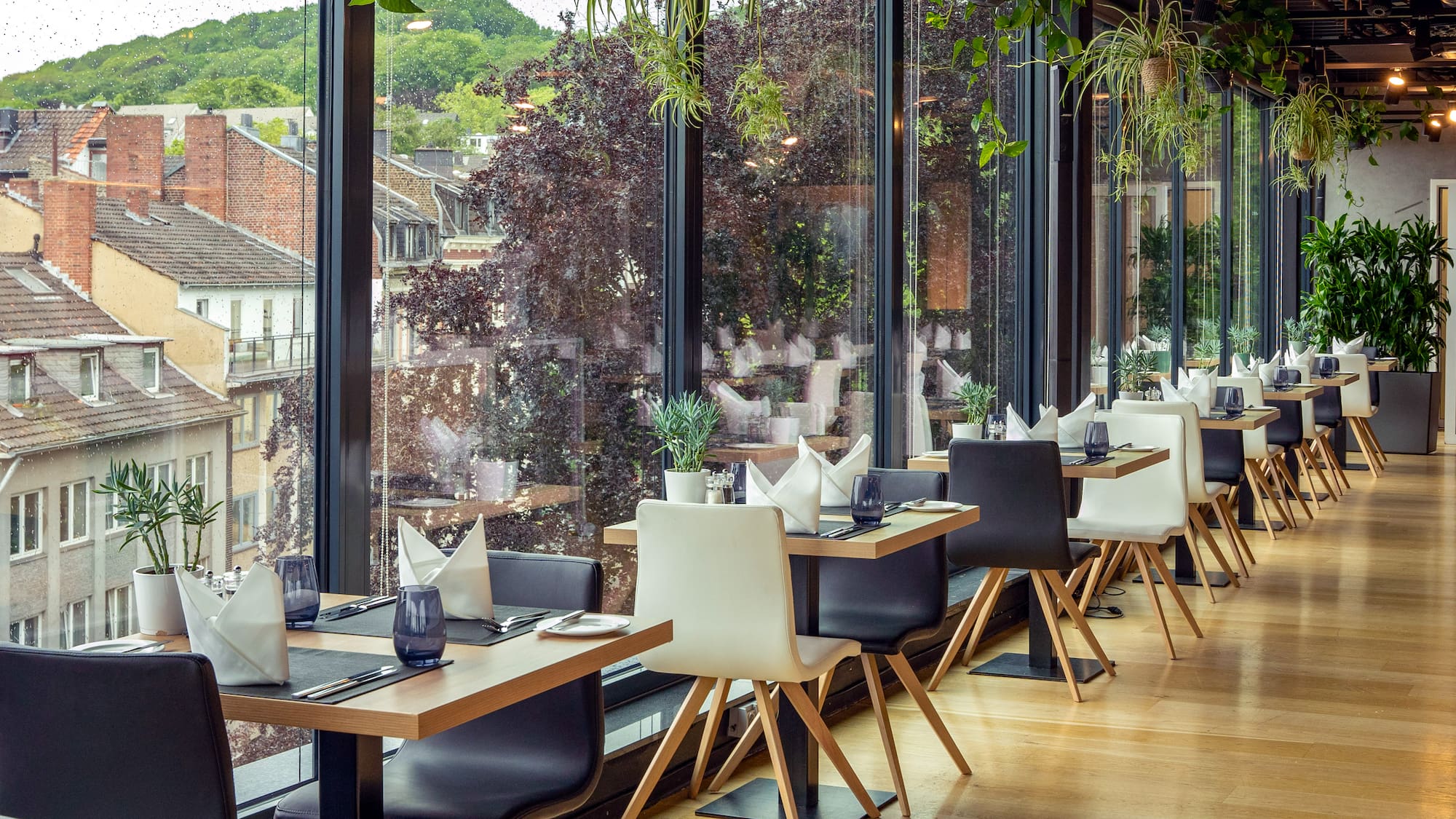 a restaurant with tables and chairs