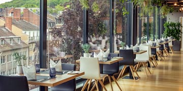 a restaurant with tables and chairs