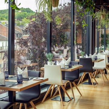 a restaurant with tables and chairs