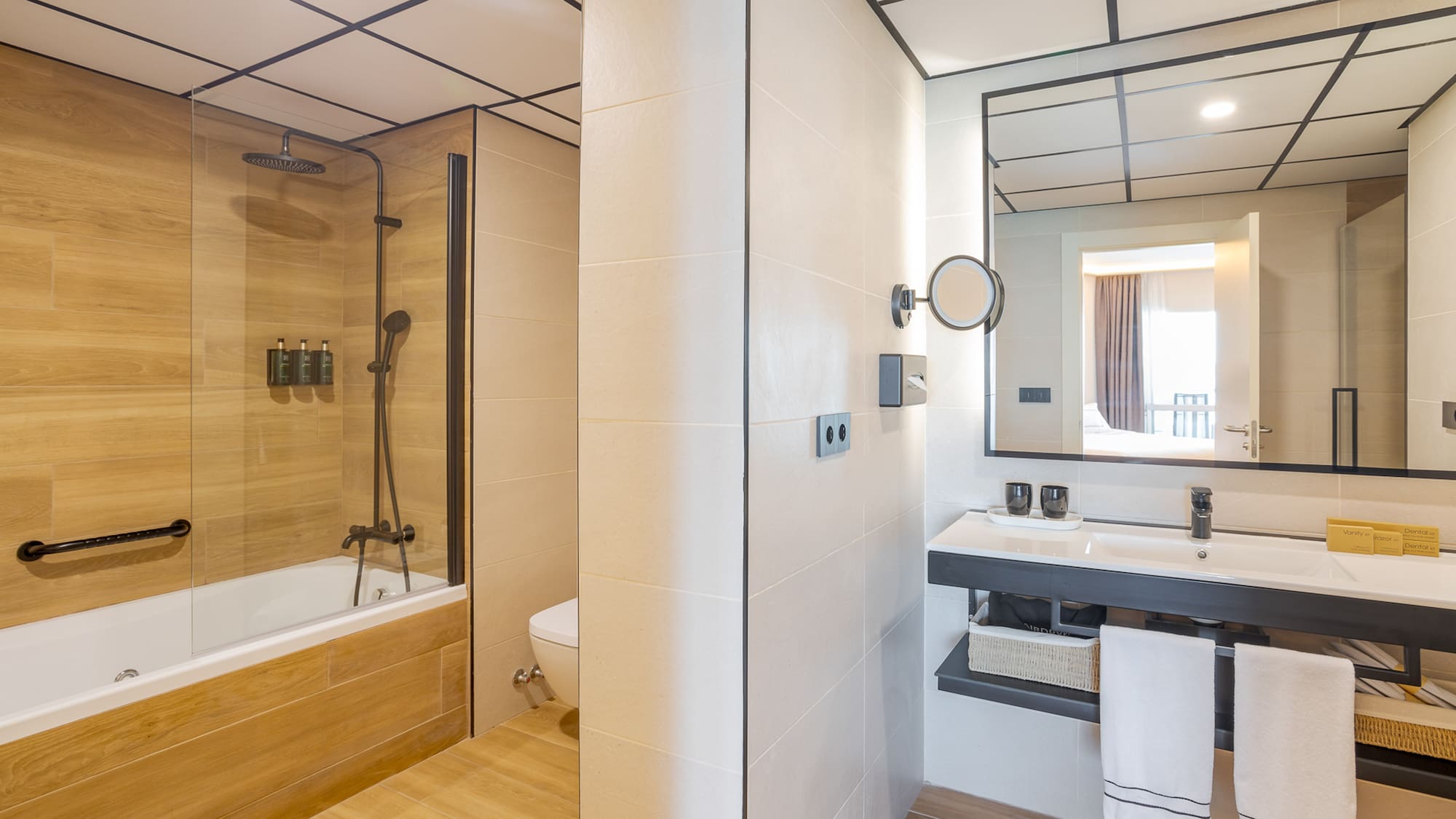 a bathroom with a wood floor and a shower