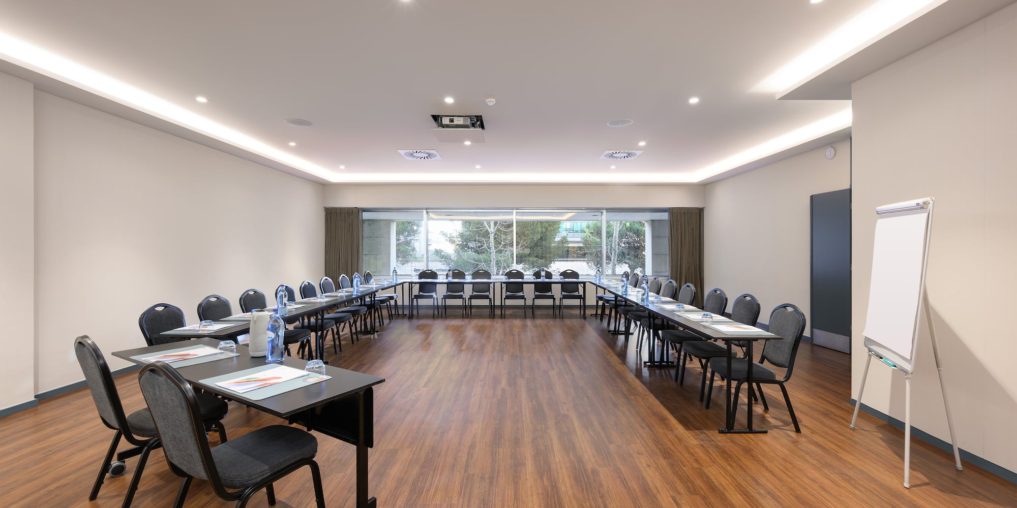 a room with tables and chairs