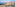 Luxury beachfront resort with modern hotels, villas, and ocean view.