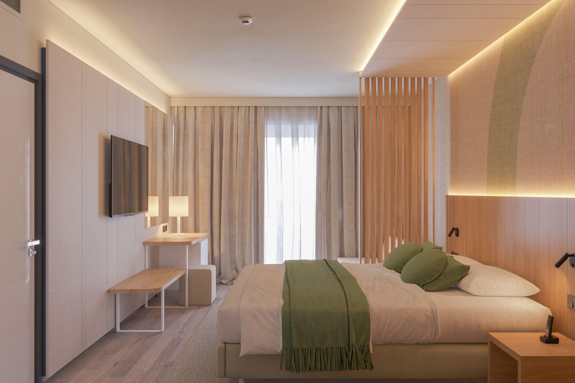 a bedroom with a bed and a tv