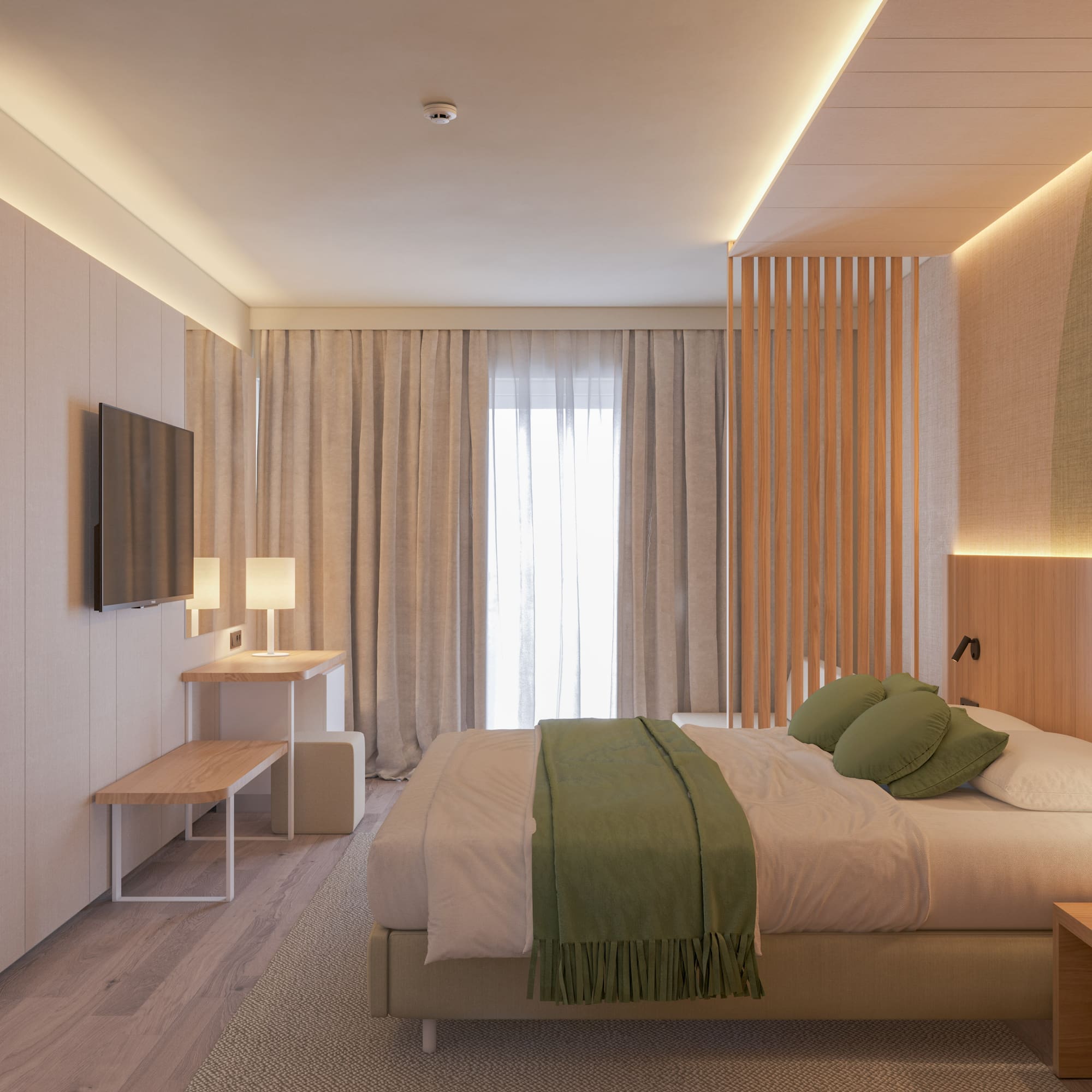 a bedroom with a bed and a tv