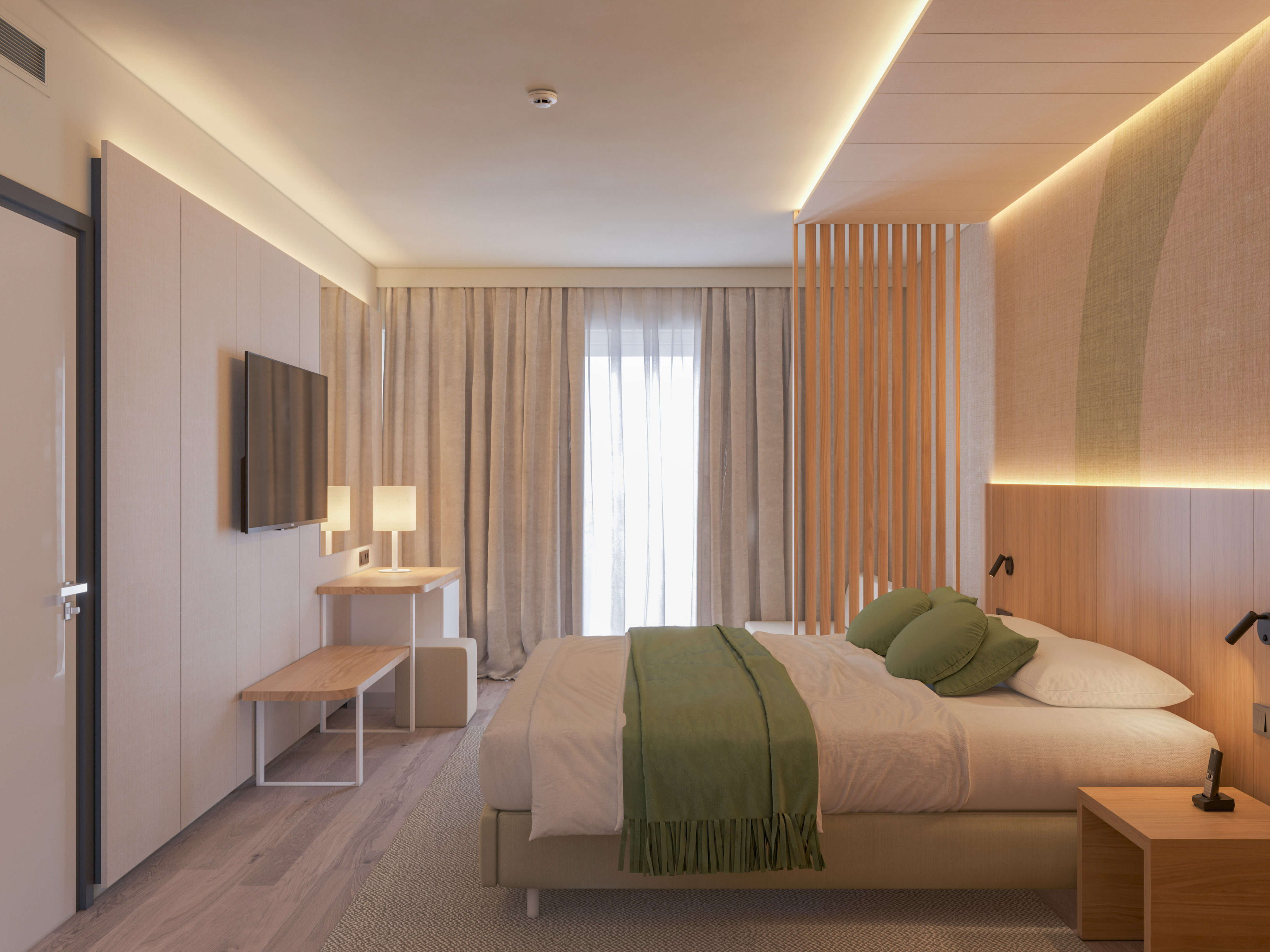 a bedroom with a bed and a tv