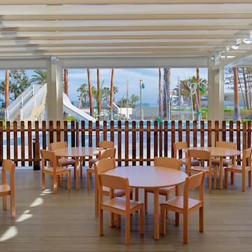a table and chairs in a room
