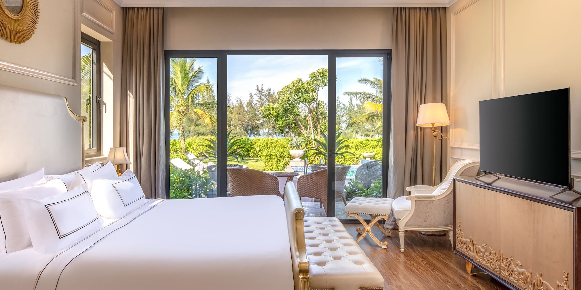 a room with a bed and a television