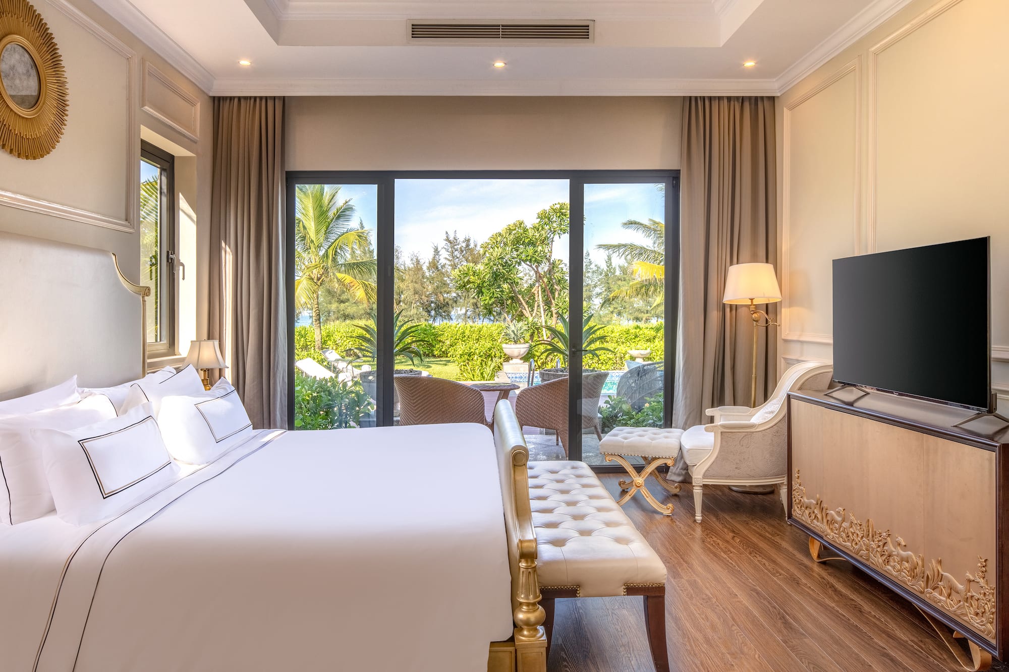 a room with a bed and a television