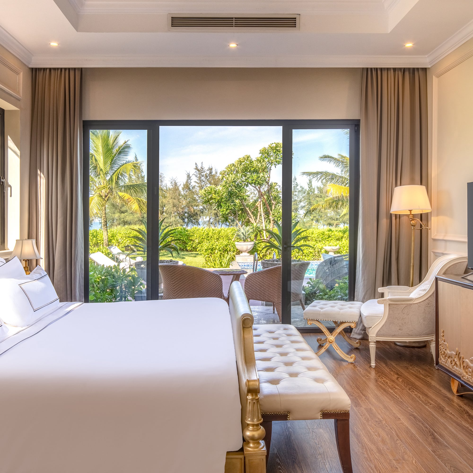 a room with a bed and a television