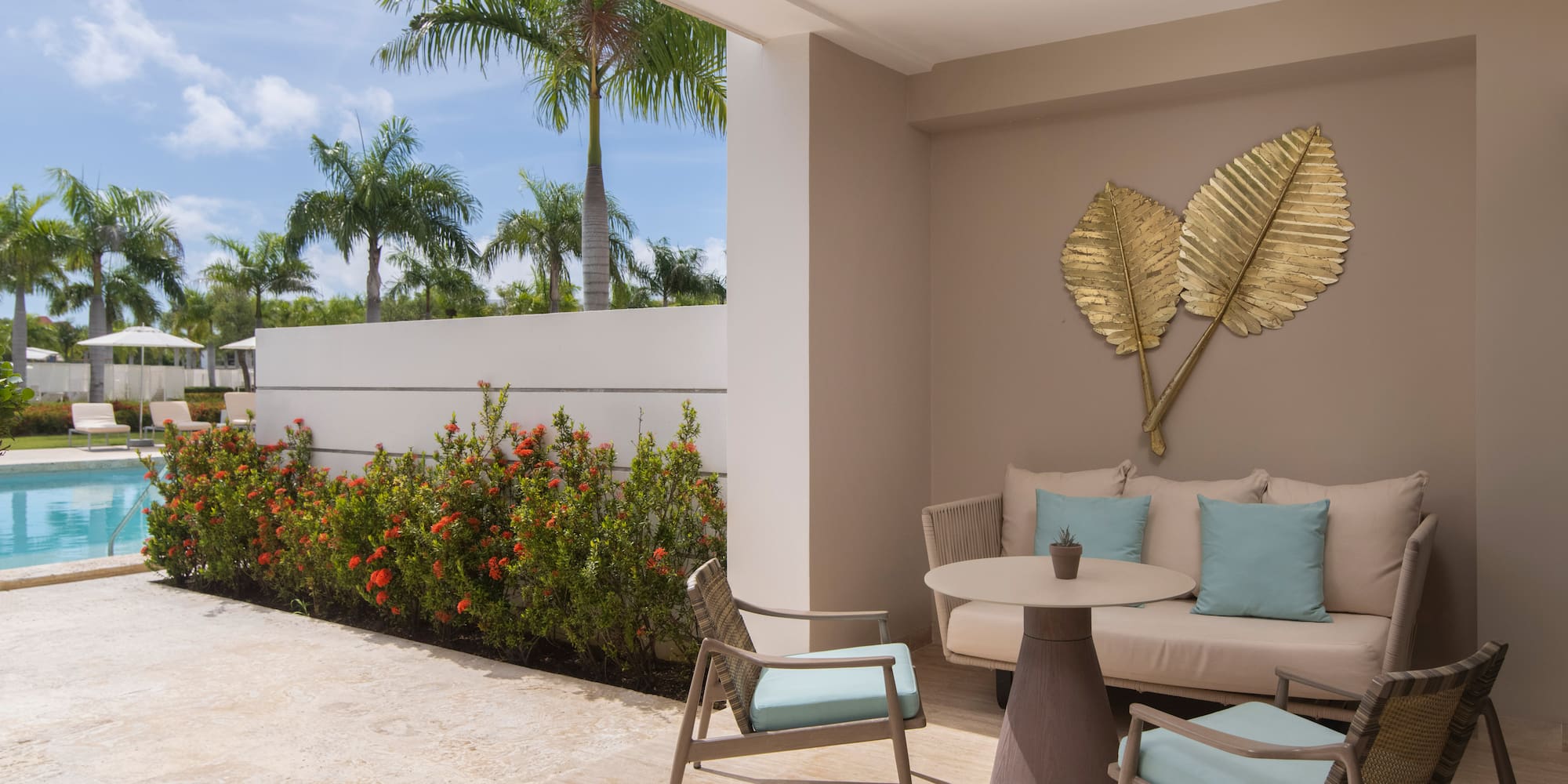 a patio with a table and chairs