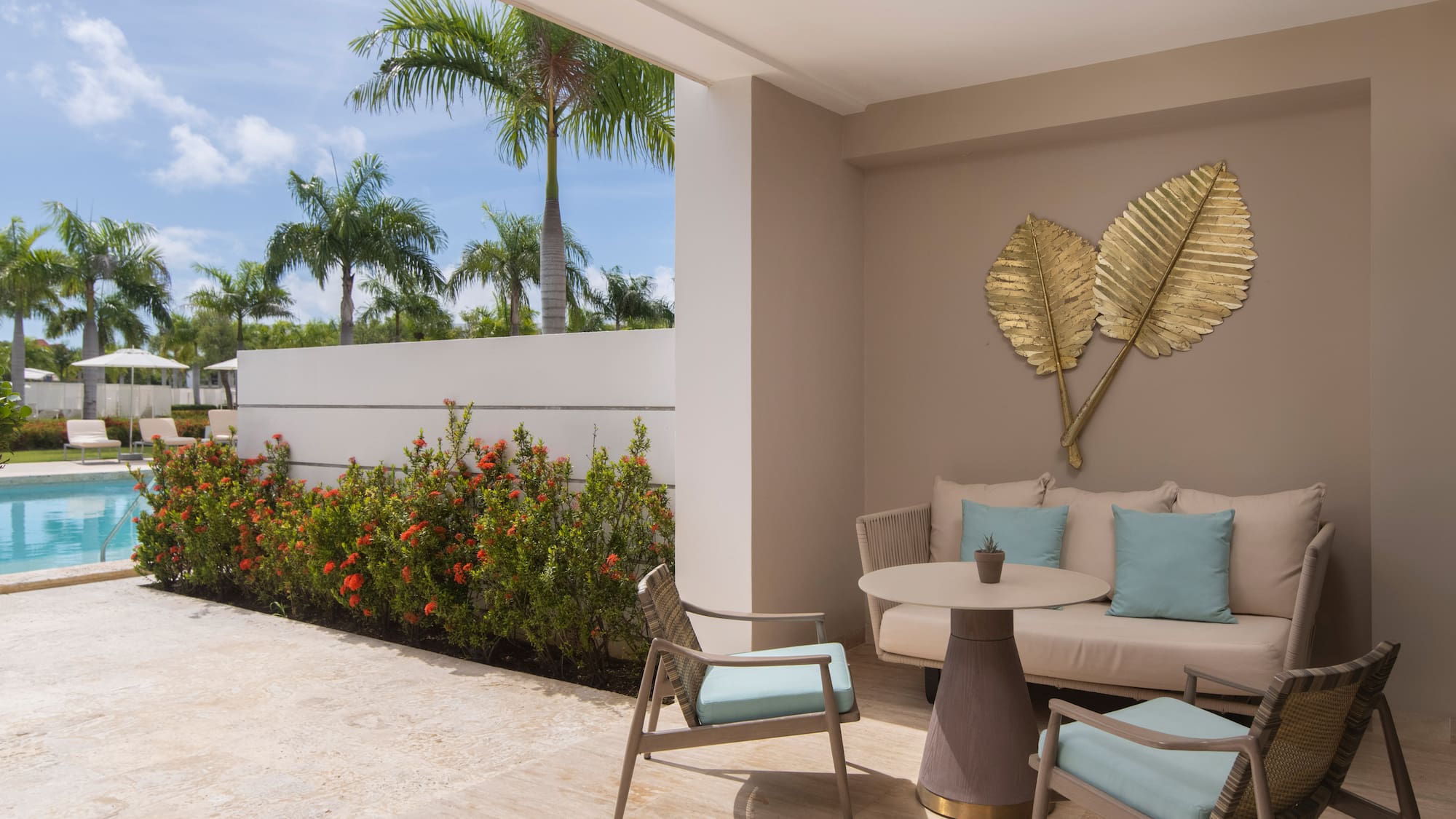 a patio with a table and chairs