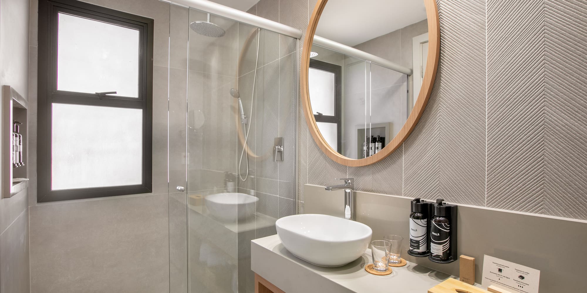 a bathroom with a mirror and a sink