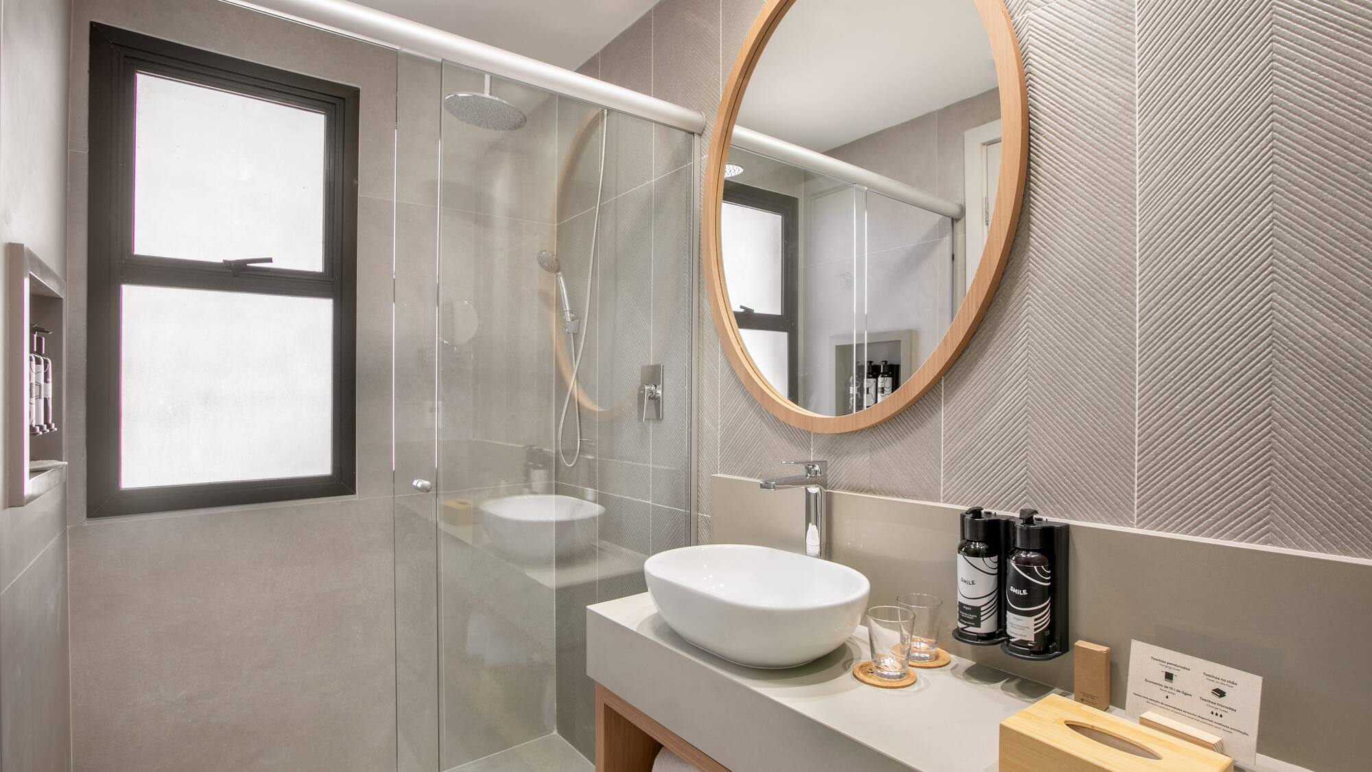 a bathroom with a mirror and a sink