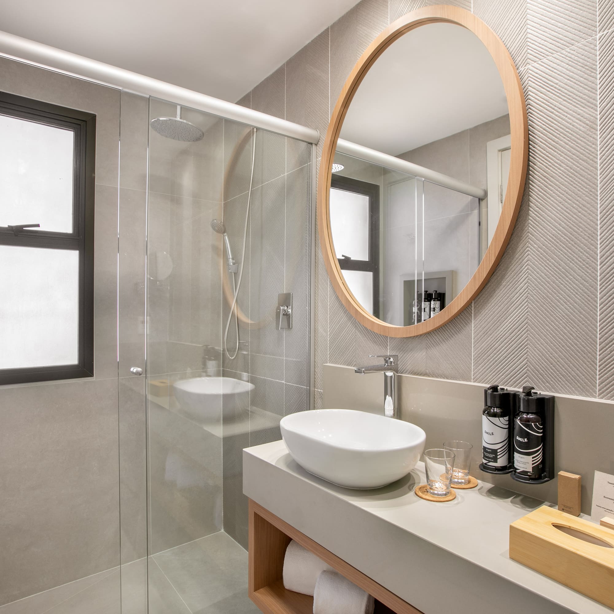 a bathroom with a mirror and a sink