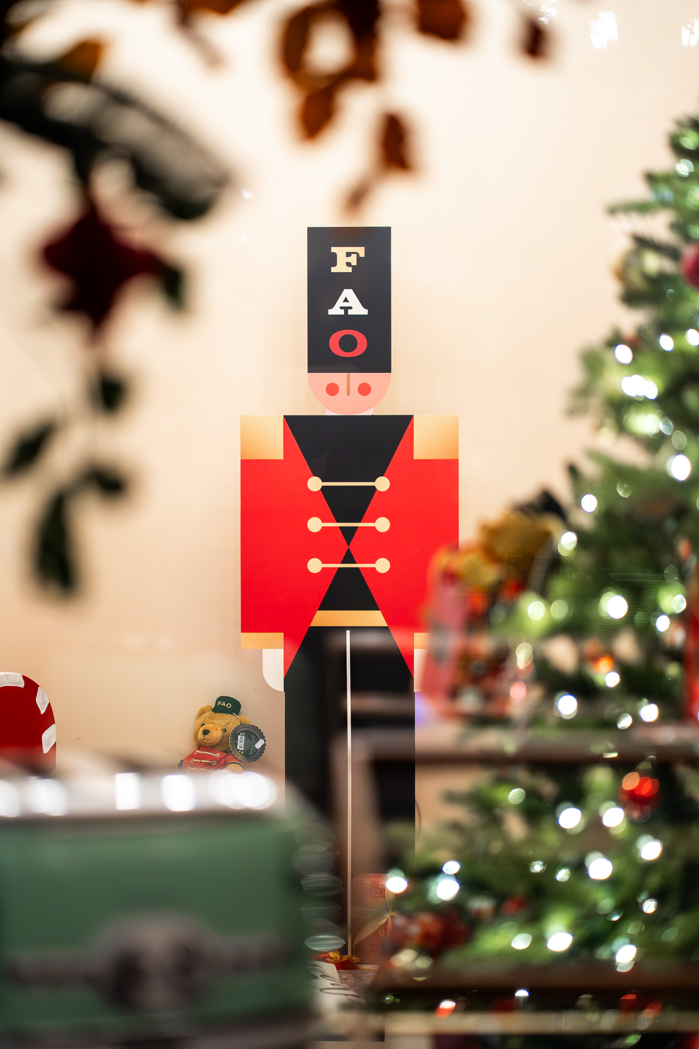 a christmas tree with lights and a toy soldier