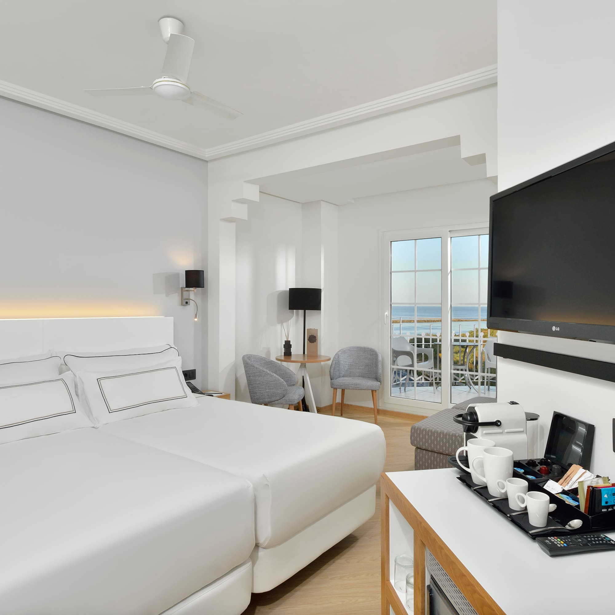 a room with a television and a bed