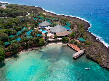 a building on a island with a body of water
