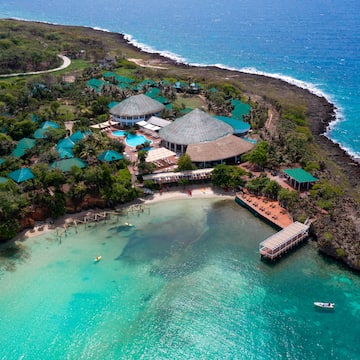 a building on a island with a body of water