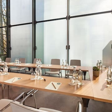 a room with tables and chairs