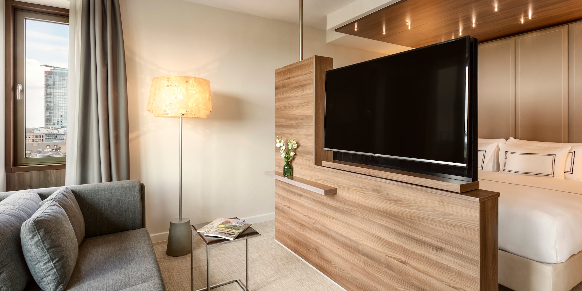 a room with a tv and a couch