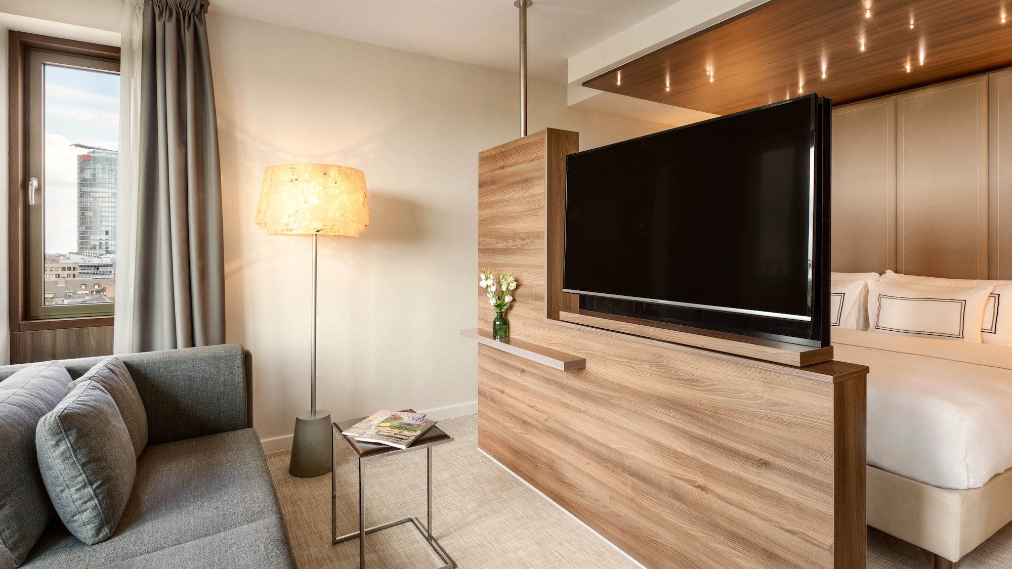 a room with a tv and a couch