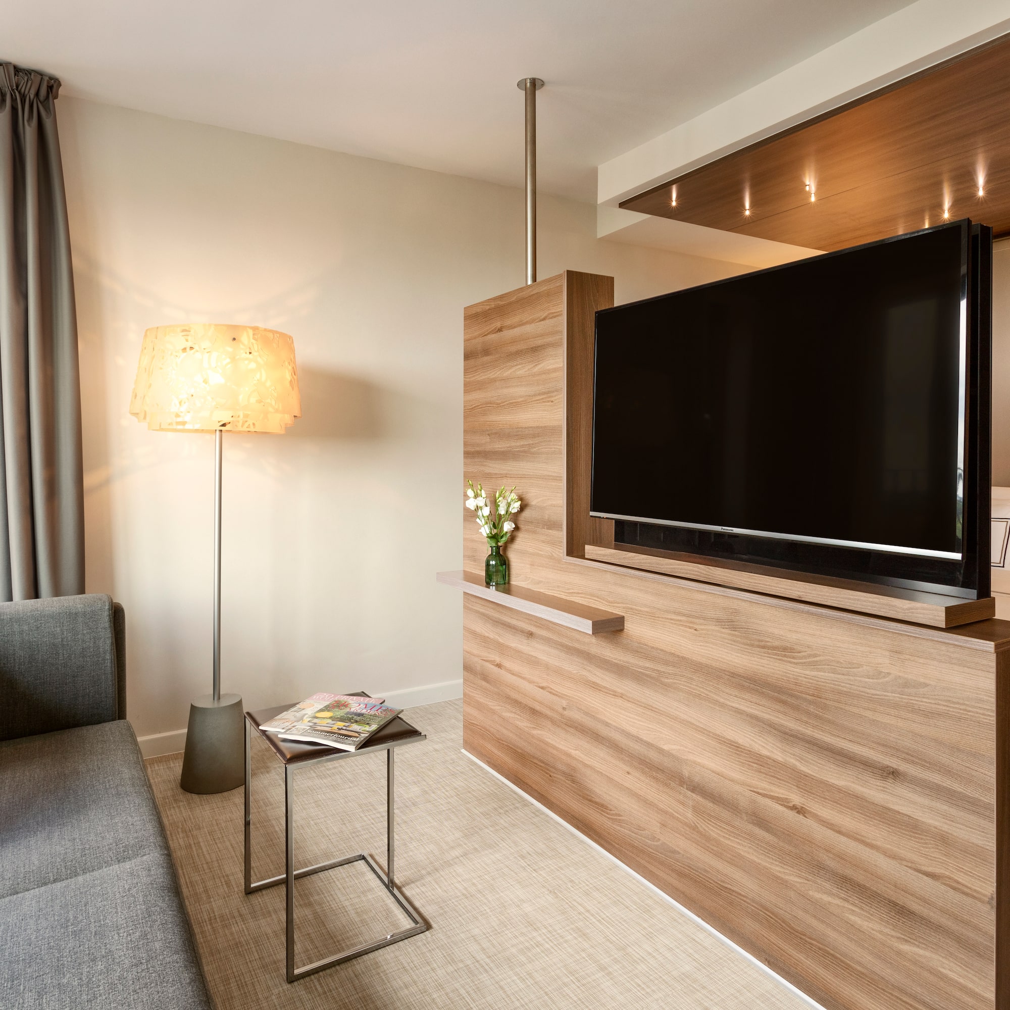 a room with a tv and a couch