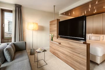 a room with a tv and a couch