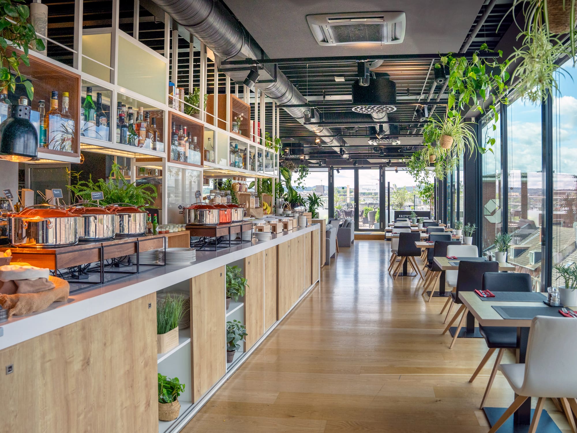 a restaurant with tables and chairs