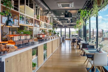 a restaurant with tables and chairs