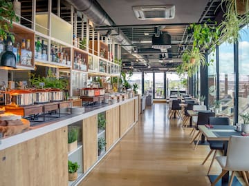 a restaurant with tables and chairs