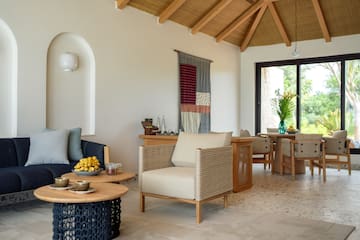 a room with a table and chairs