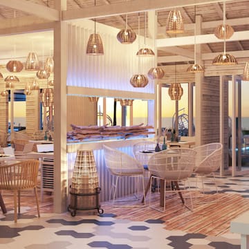 a room with tables and chairs