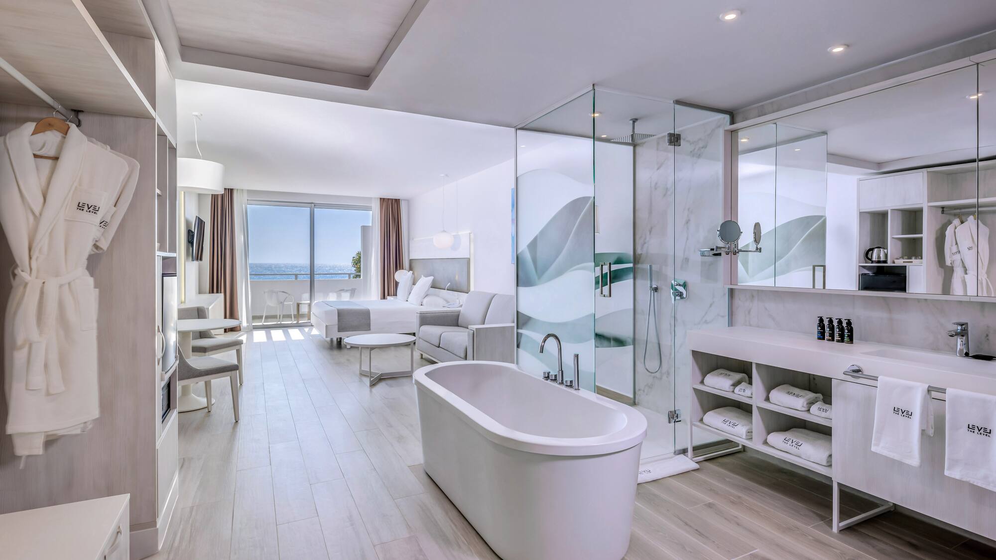 a bathroom with a tub and a shower