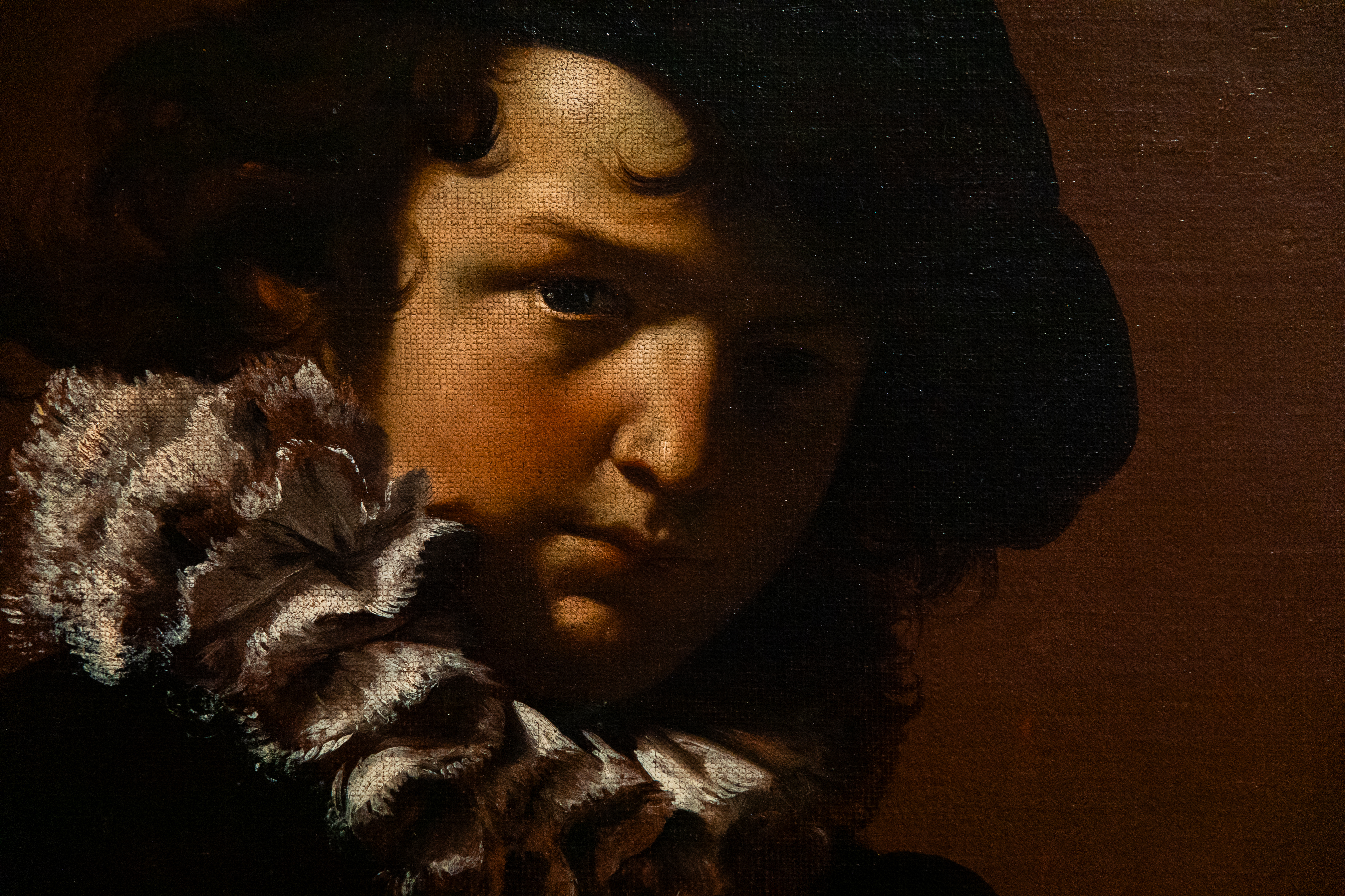 a close up of a painting of a boy