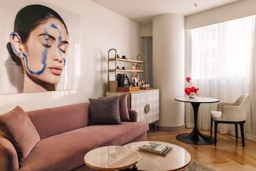 a living room with a couch and a table