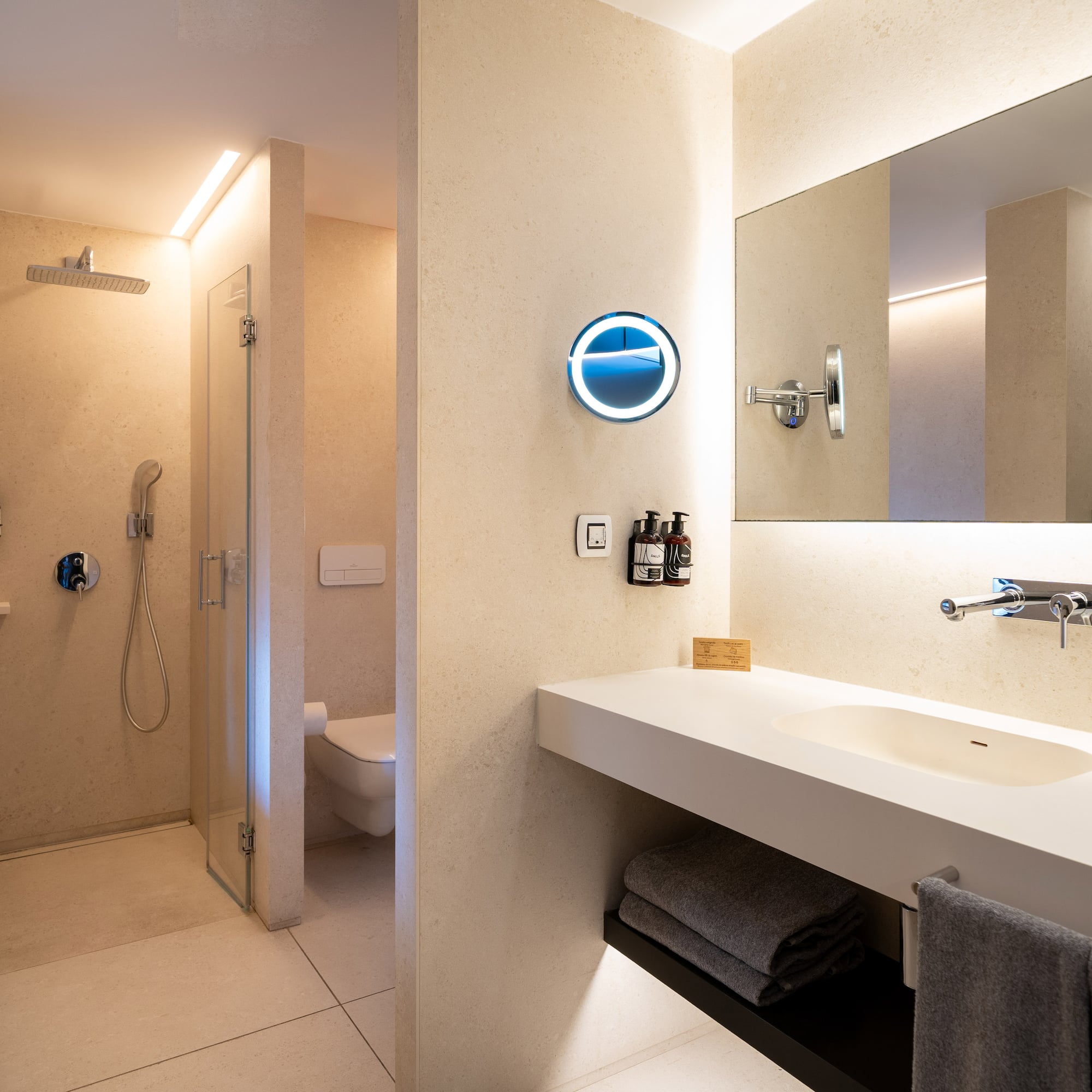 a bathroom with a shower and sink