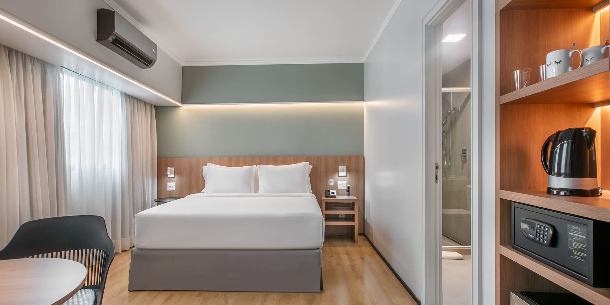 a room with a bed and a chair