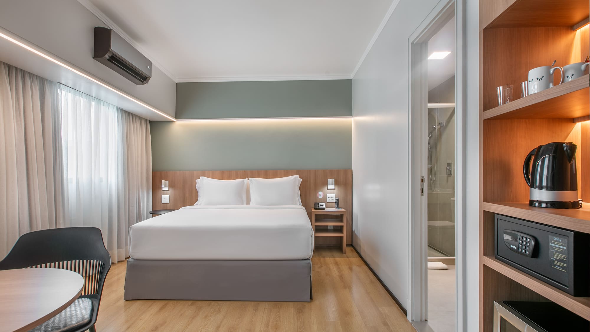 a room with a bed and a chair